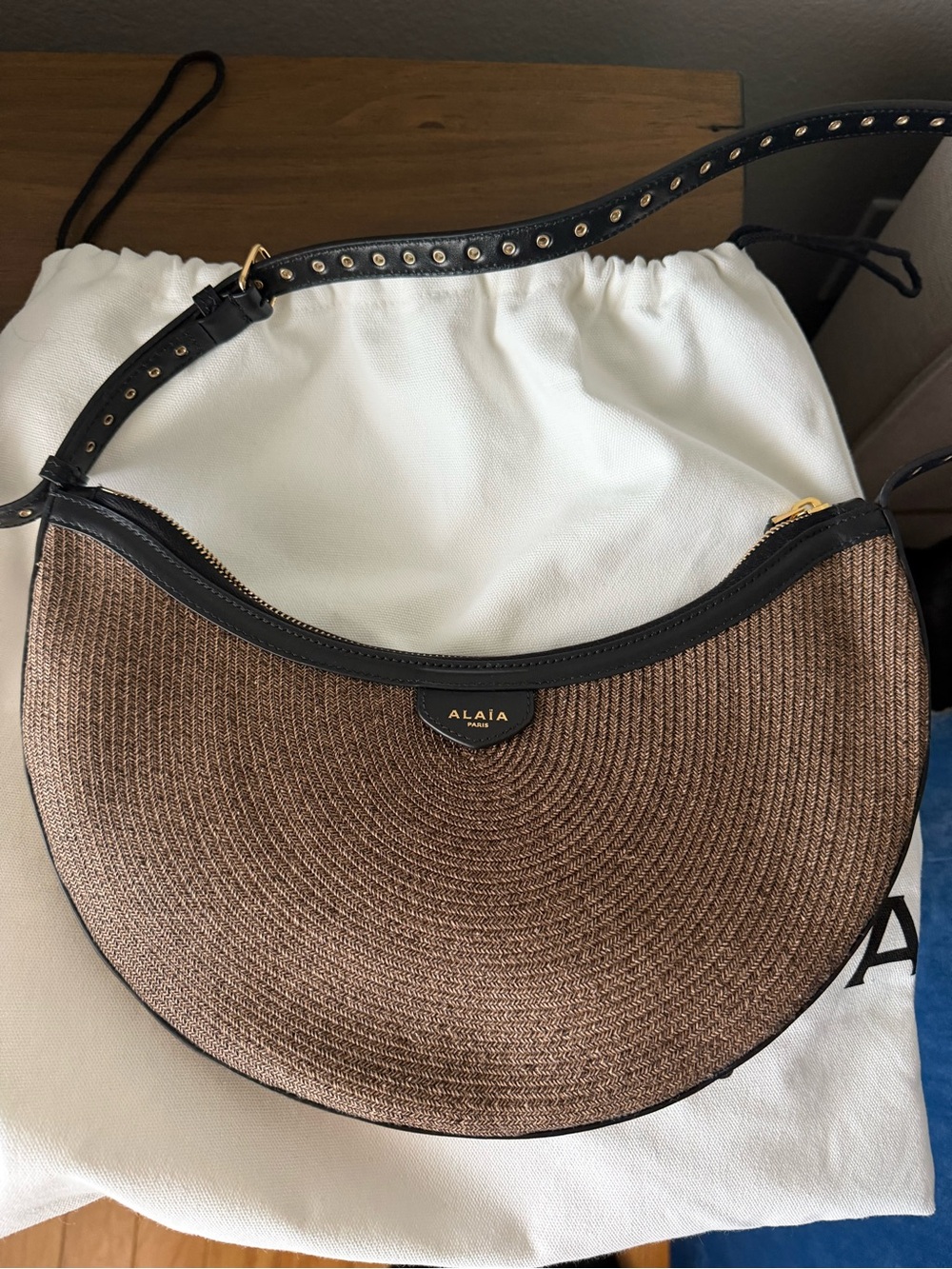 Alaïa Brown Straw-Style Crescent Shoulder Bag with Black Trim